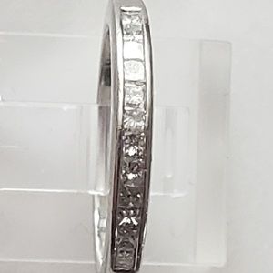 Platinum princess cut diamond band